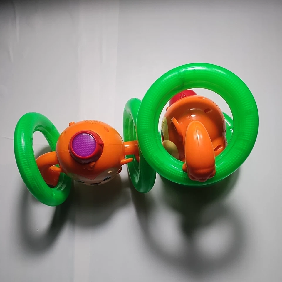 Juguete de gateo infantil mono brilla rollos hace sonidos video Foto 4 de 4