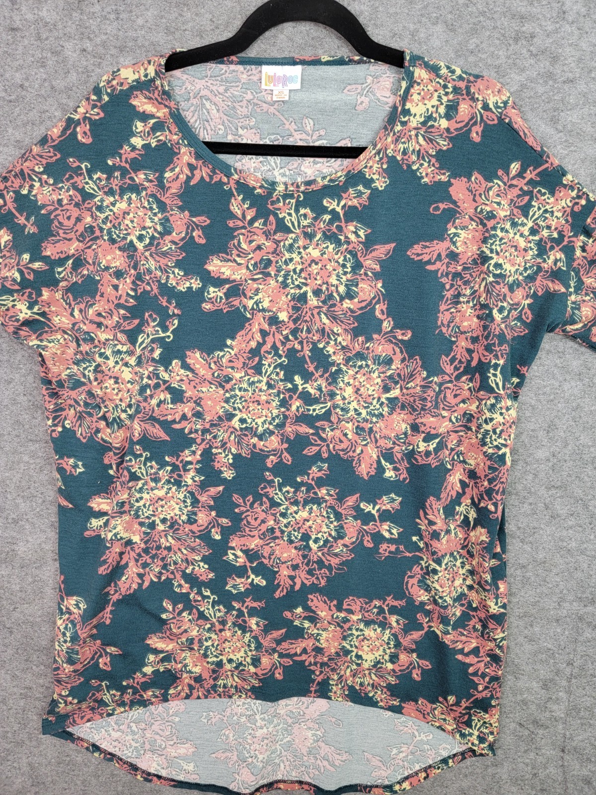 LuLaRoe irma Tunic Top Teal Peach and Yellow Floral Starburst Size XS