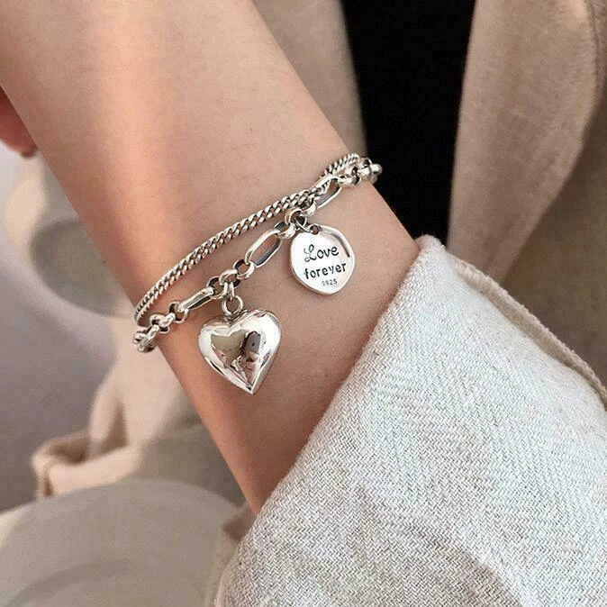 Silver shop bracelet couple