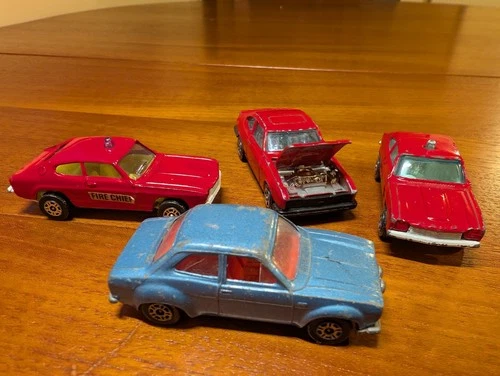 Vintage Corgi Juniors Ford model cars,  MK1 Escort, MK1 Capri Fire, MK3 red
