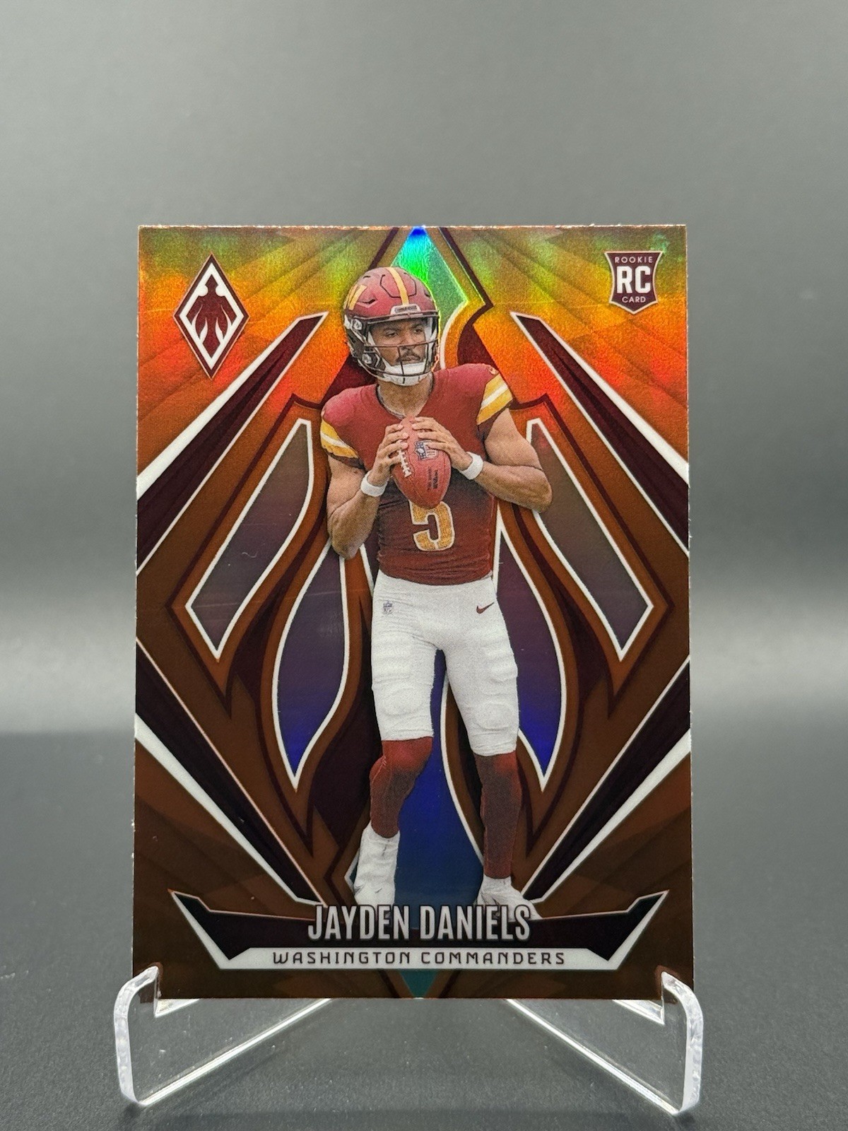 2024 Panini Phoenix Jayden Daniels RC Orange Fade #198 Commanders Rookie