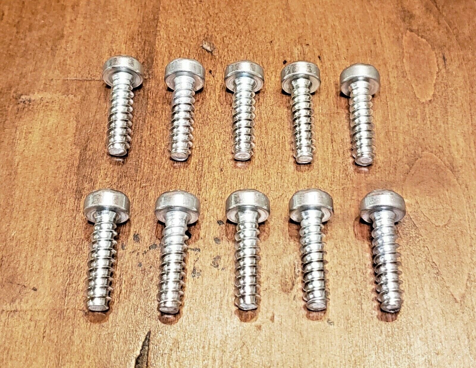 Stihl 9074 477 4448: Chain catcher special screw, OEM, refurbished