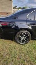 22 Toyota Camry SE Nightshade Crystal Black - close-up view