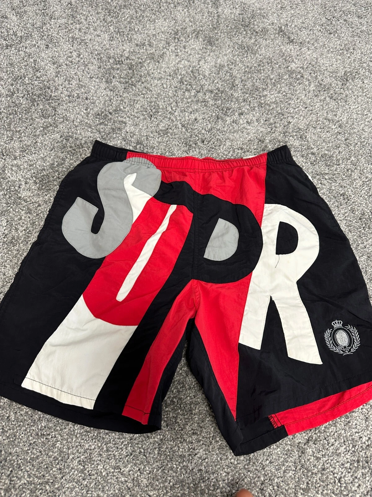 Short d'eau Supreme Big Letter noir petit utilisé en main livraison gratuite le jour même