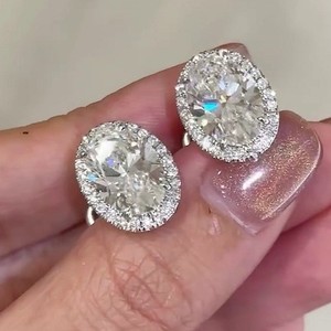 Authentic 4.25tcw Oval Cut VVS1 Moissanite Push Back Halo Earring 14k White Gold Plated