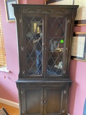 PRIORY OAK STYLE CORNER DISPLAY CABINET, LEADED GLAZED UPPER DOOR.