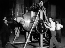 Conjurer Horace Goldin here on l presenting his act Sawing a woman- Old Photo