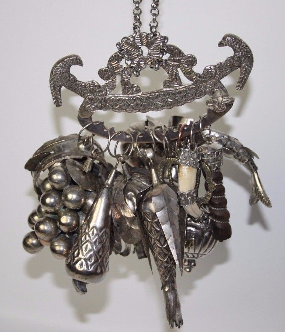 PLUMA DE BALANGANDAN. PLATEADO Y PLATEADO, BRASIL. Siglo XIX.