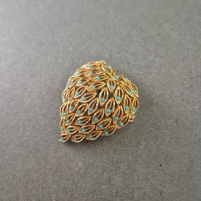 Elegante goldene Brosche mit türkisfarbenen Akzenten   Blattdesign