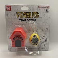 NEW SEALED BANDAI PEANUTS SNOOPY TAMAGOTCHI DIGITAL PET W/ CASE