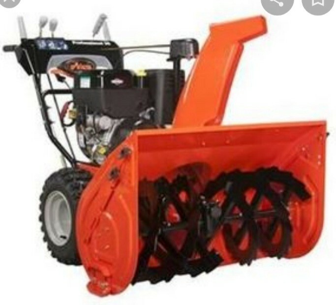 Ariens St 1236 snowblower. Orange very big but light and compact