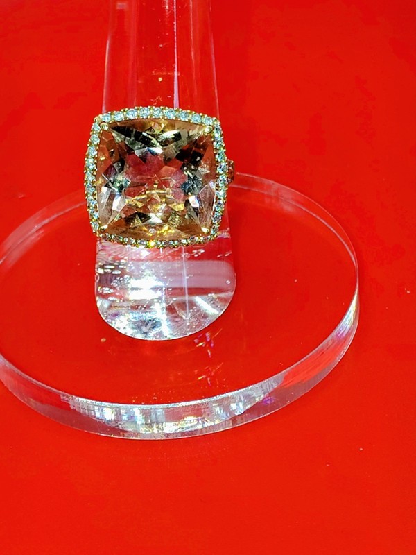 10.7 carat Morganite Ring with a diamond halo in solid 18k rose gold