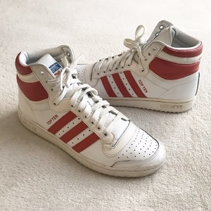 red and white adidas top ten