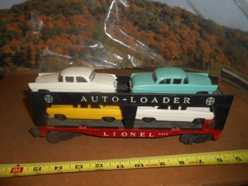 O/O-27 Lionel 6414 Auto Loader car with 4 cars.