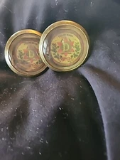 Bridle Rosette's Dubue Star Brewing Dubuque IA 2 in brass and glass