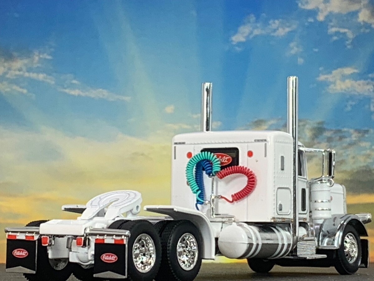 1/64 DCP WHITE PRIDE & CLASS PETERBILT 389 W/ 36