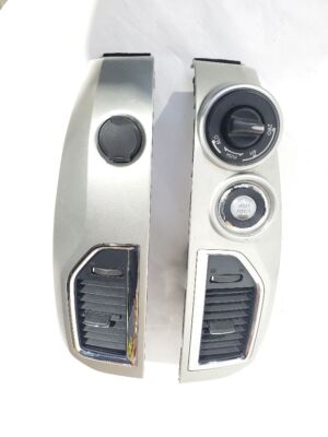 2016 Nissan Titan XD Cummins SV OEM Pair Center Dash Bezels With AC Vents