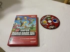 Nintendo Wii New Super Mario Bros. Disc only works some scratches w/case