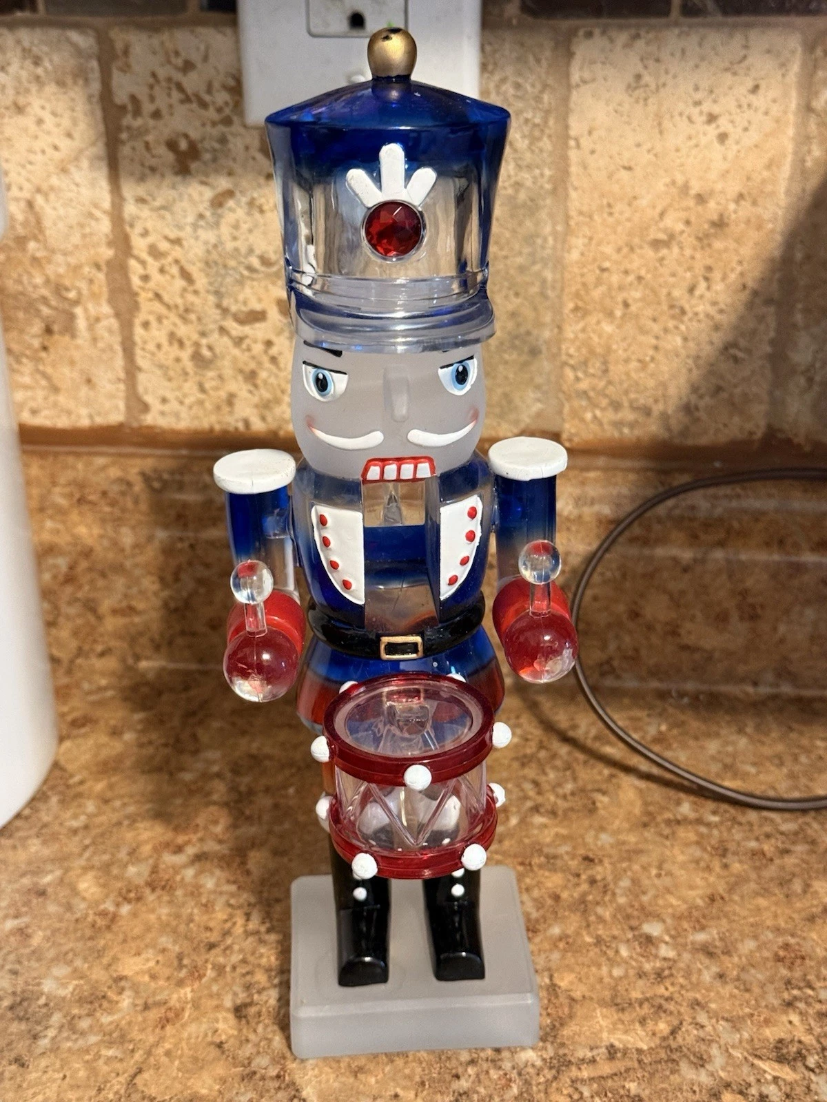 Plastic/Glass Clear Multi- Colored Nutcracker Ornamental Figurine