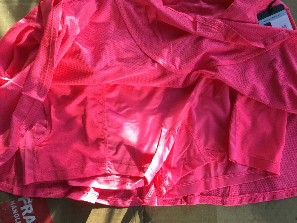 Elegant pleated tennis skirt with built-in shorts