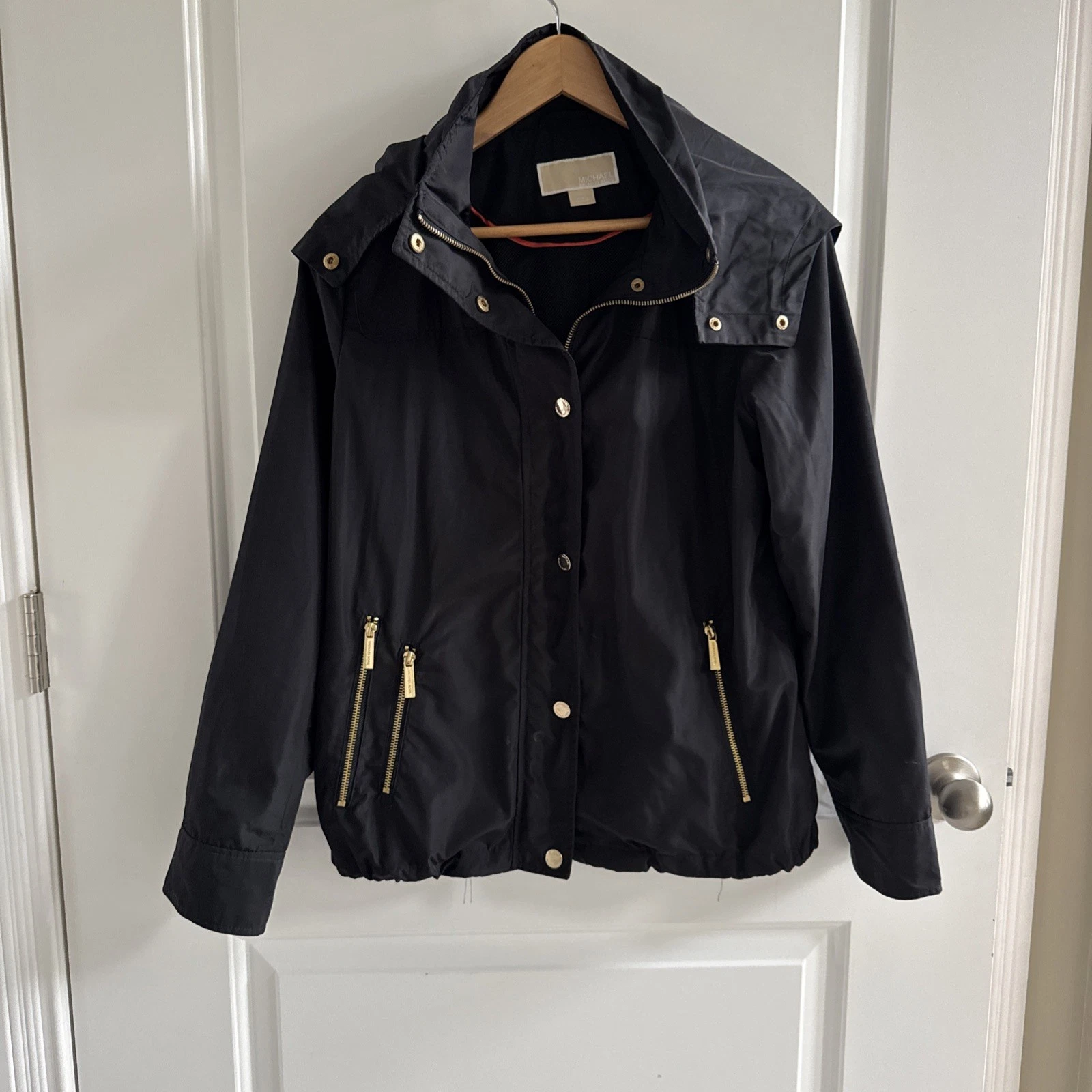 Giacca antipioggia donna Michael Kors nera taglia M cappotto con cappuccio e cintura zip logo MK