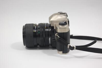 Read Nikon FM-10 SLR Camera with 35-70mm 1:5-4.8 Zoom Lens Read Nikon FM-10 SLR Camera with 35-70mm 1:5-4.8 Zoom Lens