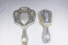 Antique art deco hand mirror and vanity brush