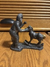 Michael Ricker Pewter with gold tones. A man with paintbrush and rocking horse￼￼