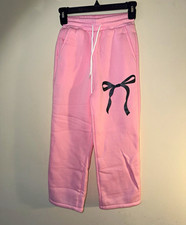 Little girl. Pink Fleece Sweatpants with bow