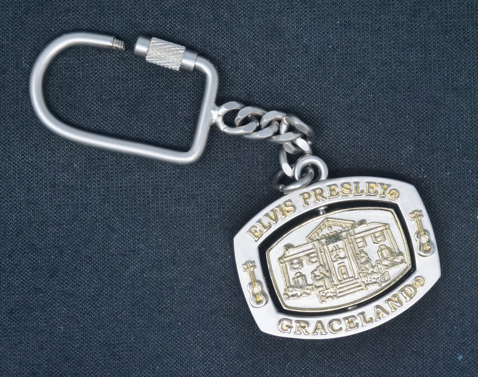 Vintage Elvis Presley Graceland Spinner Keychain