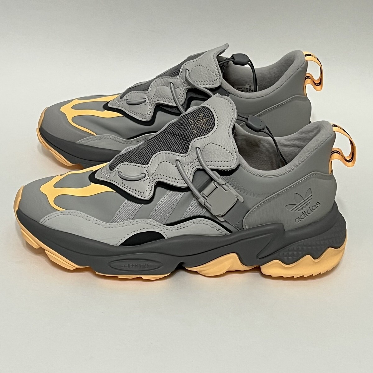 Size 7.5 - Adidas Ozweego Flipshield Grey Acid Orange for sale