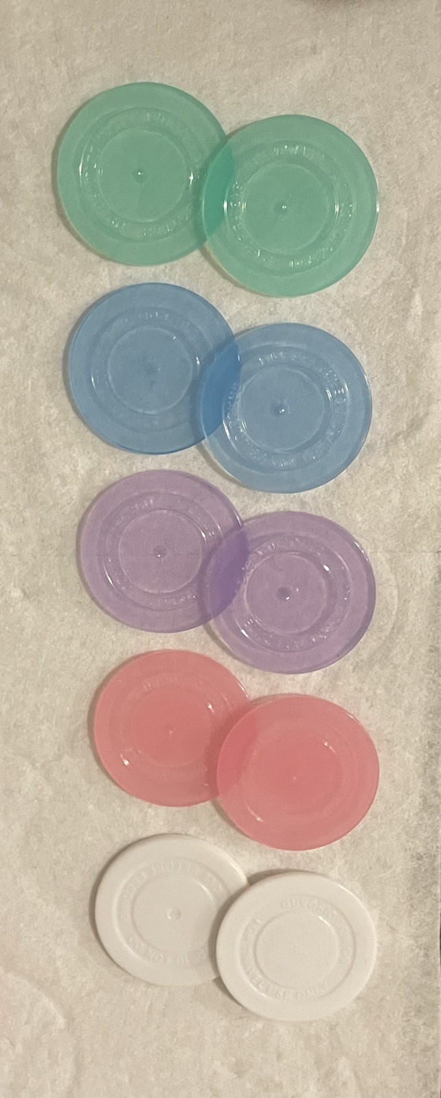 10 multi-colored Dr. Brown&rsquo;s baby bottle traveling discs ncludes rare colors