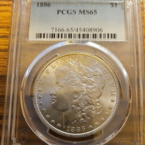 1886 ONE DOLLAR MORGAN SILVER DOLLAR GRADED PCGS MS 65