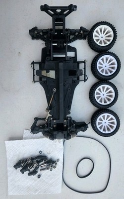 ORIGINAL TRAXXAS 4-TEC 1.0 1/10 4X4 BELT-DRIVE RC CAR ROLLER SLIDER CHASSIS