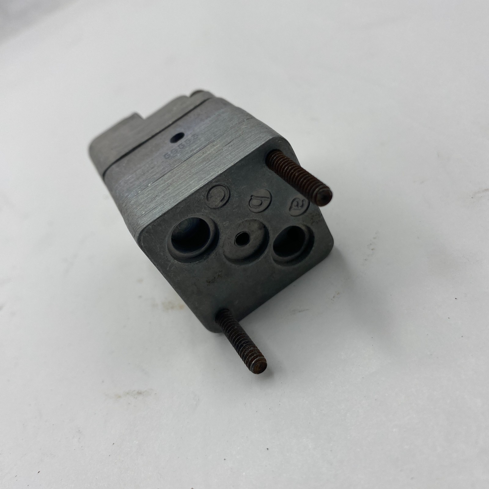 Black ARO FLUID POWER 59111 PNEUMATIC LOGIC ELEMENT with brass fitting ports and ASOS label on white background.
