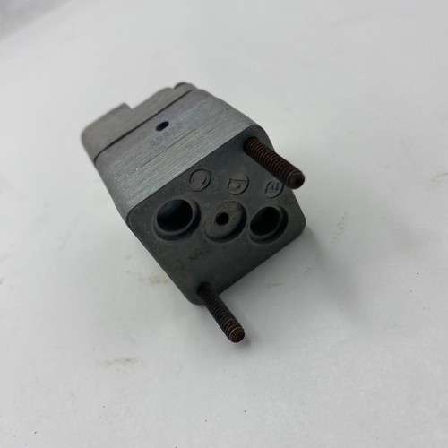 Black ARO FLUID POWER 59111 PNEUMATIC LOGIC ELEMENT with brass fitting ports and ASOS label on white background.