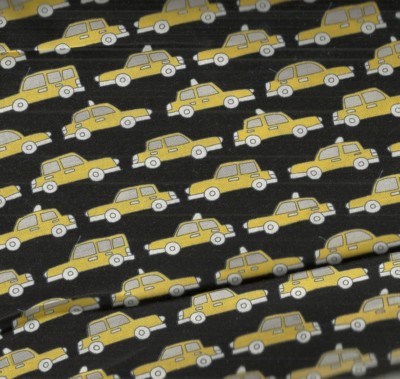 Uptown cars taxi cab black gold retro Kaufman fabric