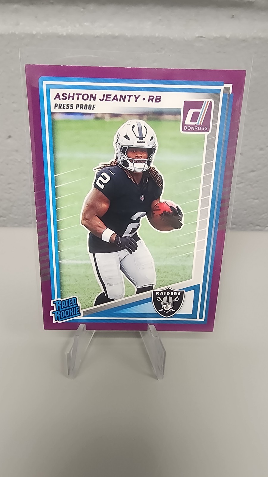 2025 Panini Donruss Rated Rookie Ashton Jeanty #305 Purple Press Proof Raiders