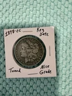 1878-CC MORGAN SILVER DOLLAR. KEY DATE! TONED! NICE GRADE!