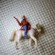 Vintage plastic cowboy toy figure manufactured by Timpo in the 1960s.