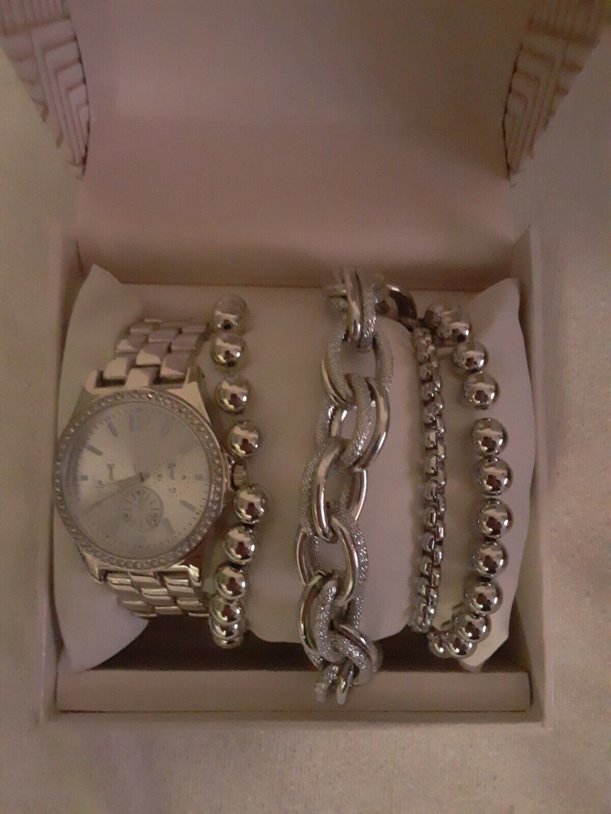 Silver Folio women's watch and 4 Bracelet Set