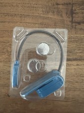 Clip-on book light /reading light packaged with its included power sources