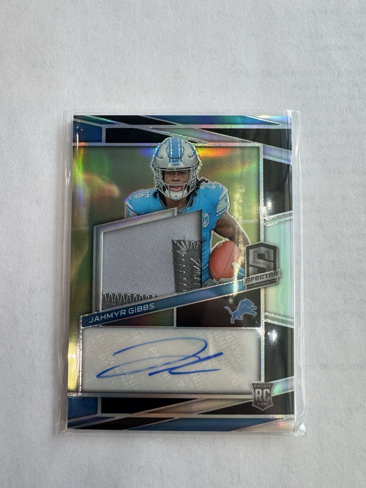 2023 Panini Spectra -Rookie Patch Autographs Jahmyr Gibbs #212 /99 (AU, MEM, RC)