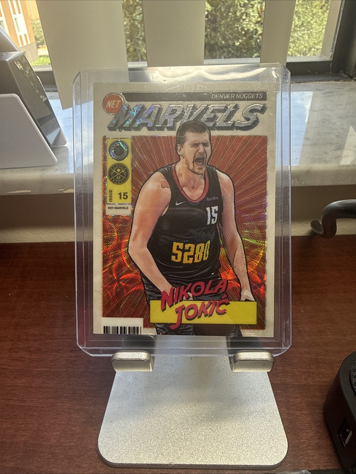 Nikola Jokic 2023-24 HOOPS Premium Stock Net Marvels Case Hit SSP