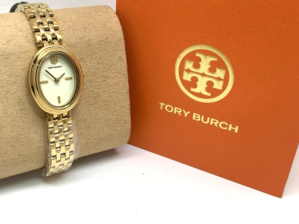 Reloj para mujer Tory Burch TBW6032 cuarzo ovalado esfera crema dorado acero inoxidable Foto 3 de 4