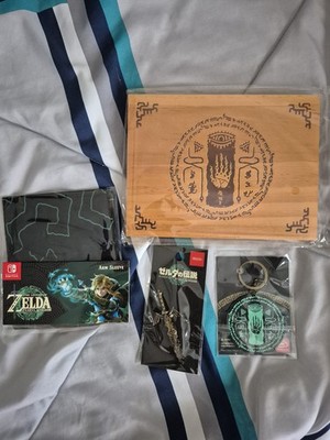 Nintendo Legend of Zelda Collectables lot: Arm Sleeve, Wood Panel, keychain, pin