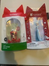 tonies Disney frozen and Elmo in Spanish brand new not opened