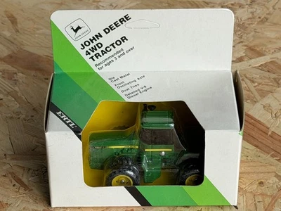 ERTL 1:64 JOHN DEERE 8850 4WD TRAKTOR TRACTOR NEU IN OVP (M-7) - Bild 1 von 2
