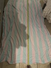 A modern striped Tablecloth with pink and light blue/