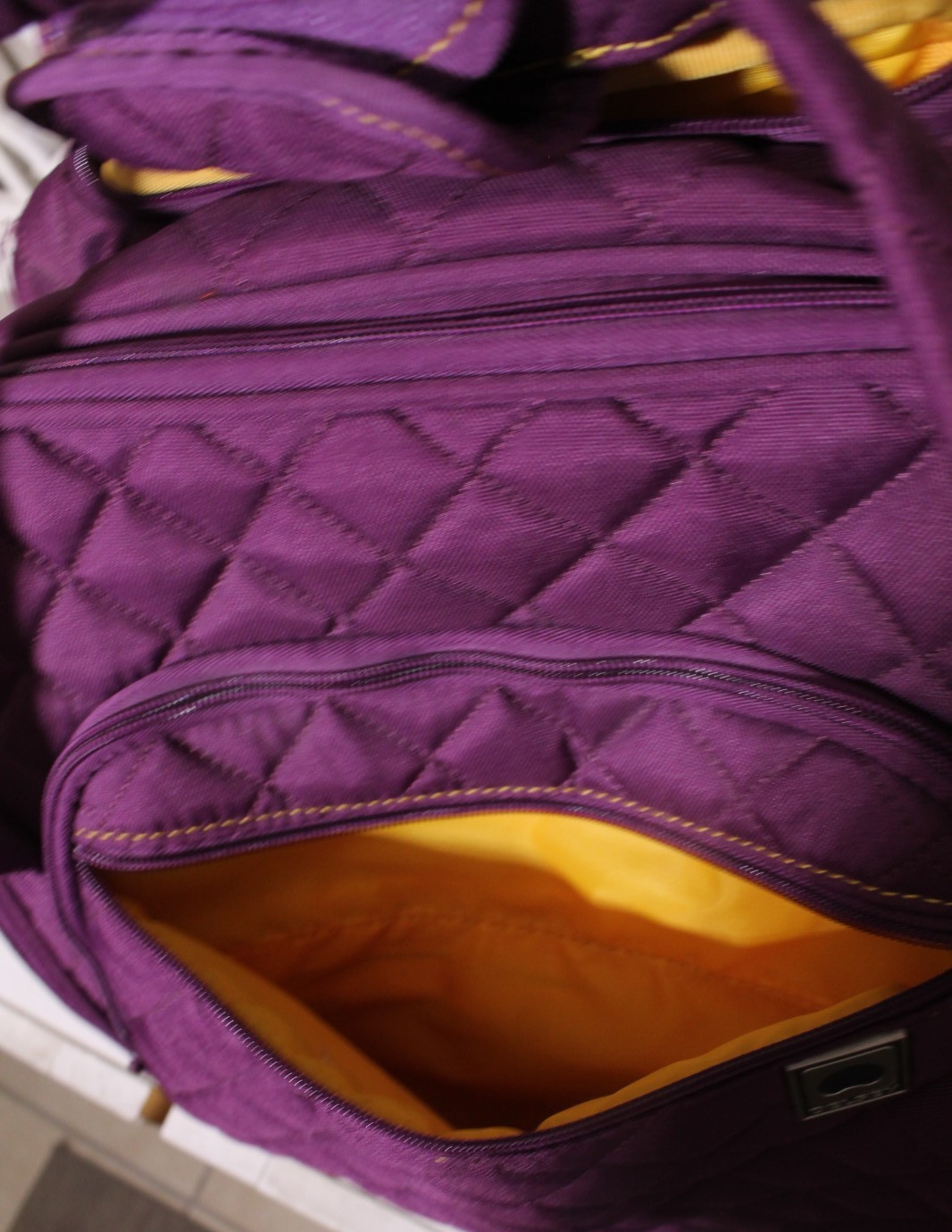 DELSEY PARIS Rolling Tote Bag Purple Quilted Under-Seater 2 Wheels Travel